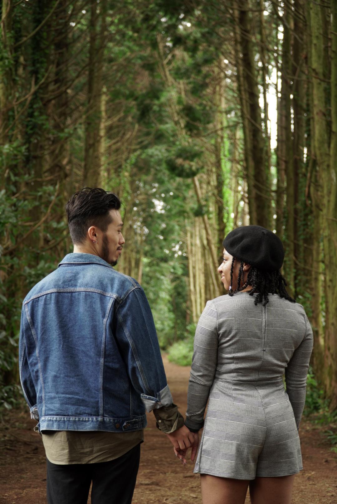 Maleea and Jae in a forest